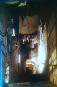 I know this is an unclear picture, but it's of the little streets with washing hanging above.